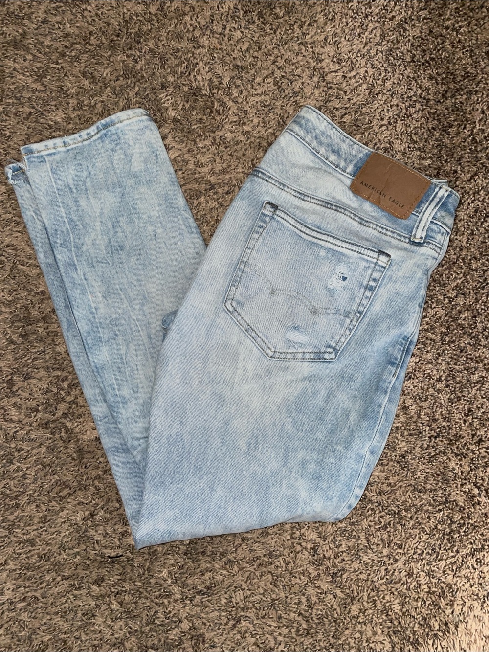 American Eagle Outfitters Light Blue Skinny Jeans with Subtle Distress